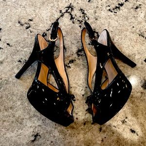 Guess women’s black peep toe heels with adjustable back